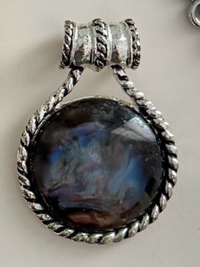 Lia Sophia Silver-Tone Rope Frame Pendant with Iridescent Black-Blue Stone